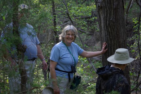 Kathryn and others wait to cross a small stream on the trail.