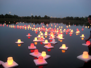Hiroshima citizens float candles in the river, Hiroshima Day 2008
