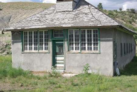 In this photo the sign is legible:  "Colorado State Approved School, 1895." 