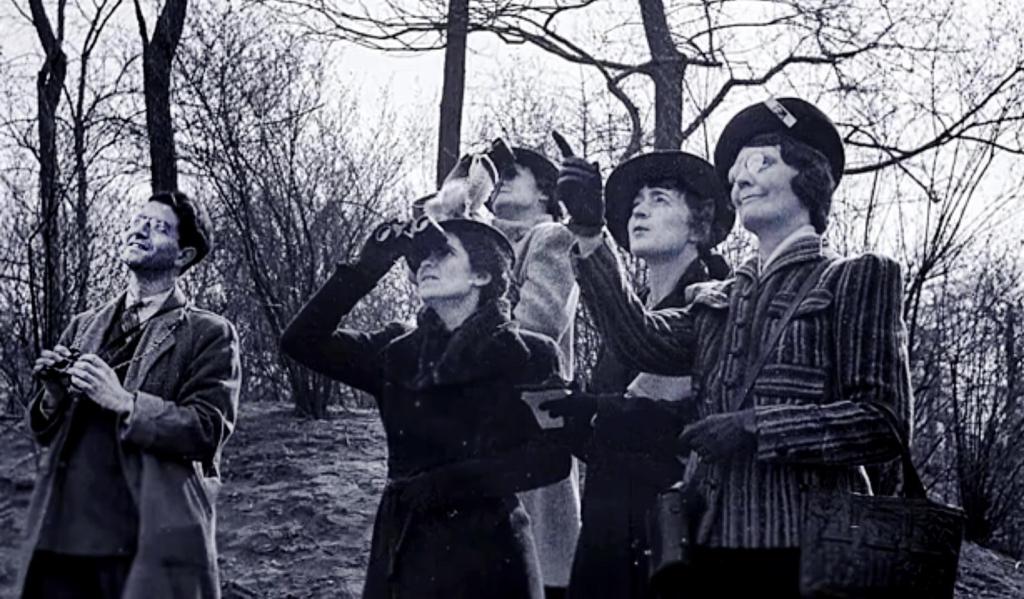 Still photo captured from the film, “Christmas Bird Count,” by Chan Robbins; photo shows a group counting birds, probably in the 1940s or 1950s. Audubon’s Christmas Bird Count got its start in 1900.