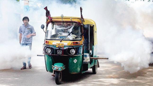 A small vehicle fogging streets of Delhi, India, with DDT, to fight mosquitoes. File photo from India Today, used to illustrate the story only.