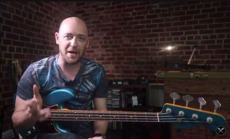 Scott Devine and a blue Fender Bass. Scott's the guy behind the YouTube monster, Scott's Bass Lessons.